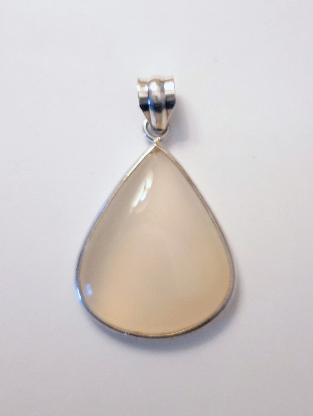 Sterling Silver Teardrop Pendant with Cream Stone